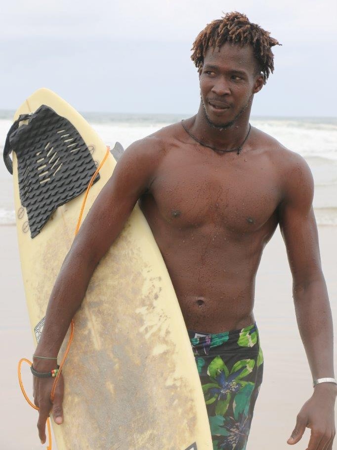 Alphonse holds a board