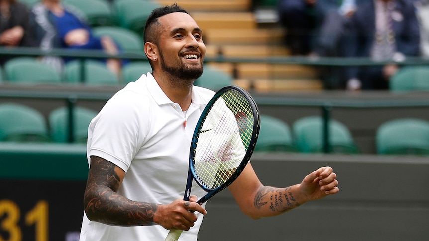 Nick Kyrgios celebrates at Wimbledon