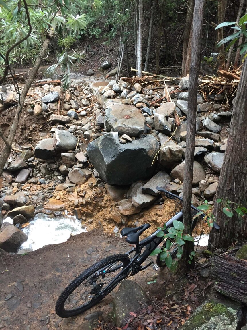Stone bridge on mountain bike track washed away