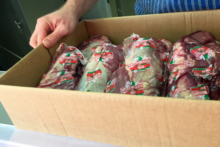 Halal meat packaged in plastic in cardboard box