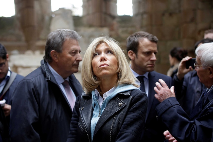 Brigitte Macron looks skyward at Oradour-sur-Glane