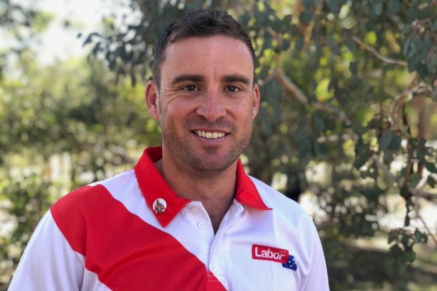 A man in a Labor Party shirt.