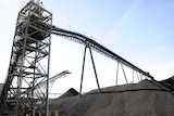 Mine infrastructure in a coalfield, blue sky.