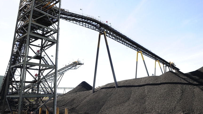 Mine infrastructure in a coalfield, blue sky.