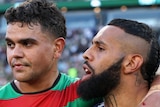 South Sydney Rabbitohs' Latrell Mitchell puts his arm around Canterbury Bulldogs' Josh Addo-Carr after an NRL game.
