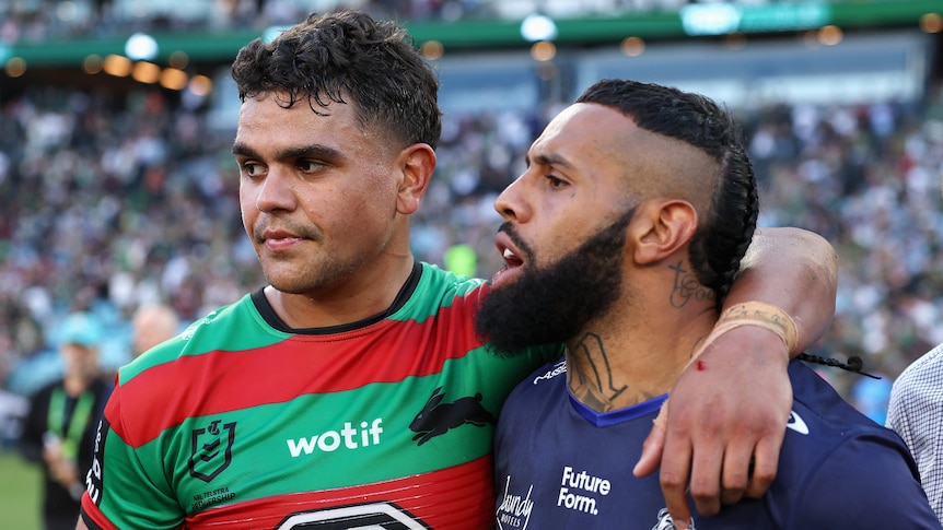 South Sydney Rabbitohs' Latrell Mitchell puts his arm around Canterbury Bulldogs' Josh Addo-Carr after an NRL game.
