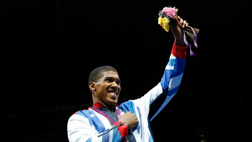 Joshua celebrates with Olympic gold