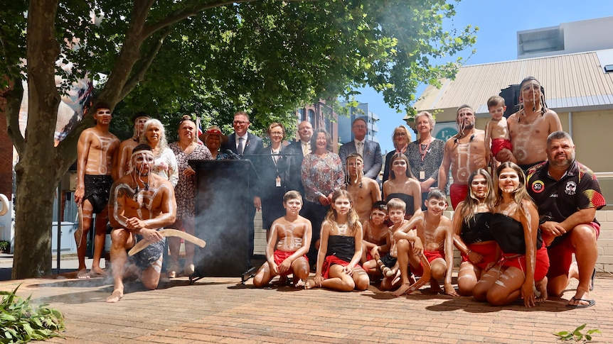 Judges with Indigenous dancers and elders