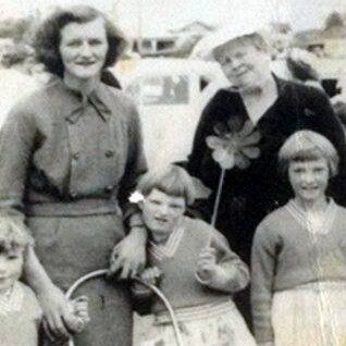 A young Wil Sprake (left) with her sisters, mother and grandmother at the infamous Natimuk Show. Black and white in the 1960s.