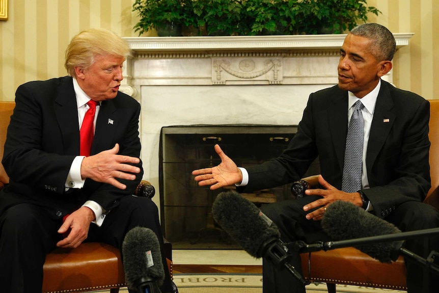 US President Barack Obama shakes hands with President-elect Donald Trump