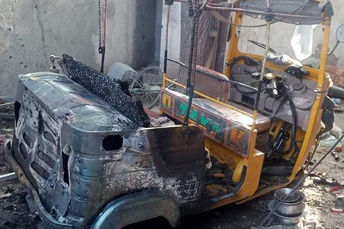 A burnt out autorickshaw lies damaged following a US drone strike that killed a mid-level Islamic State planner in Afghanistan