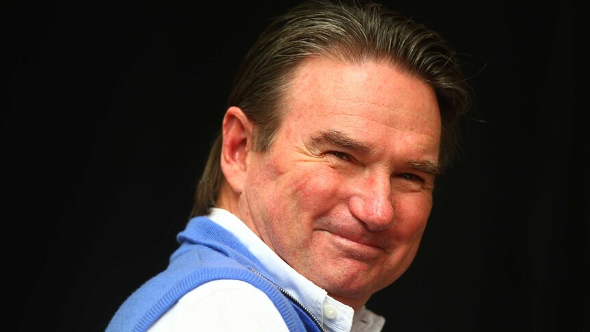 Tennis great Jimmy Connors smiles after an interview at the 2012 US Open.