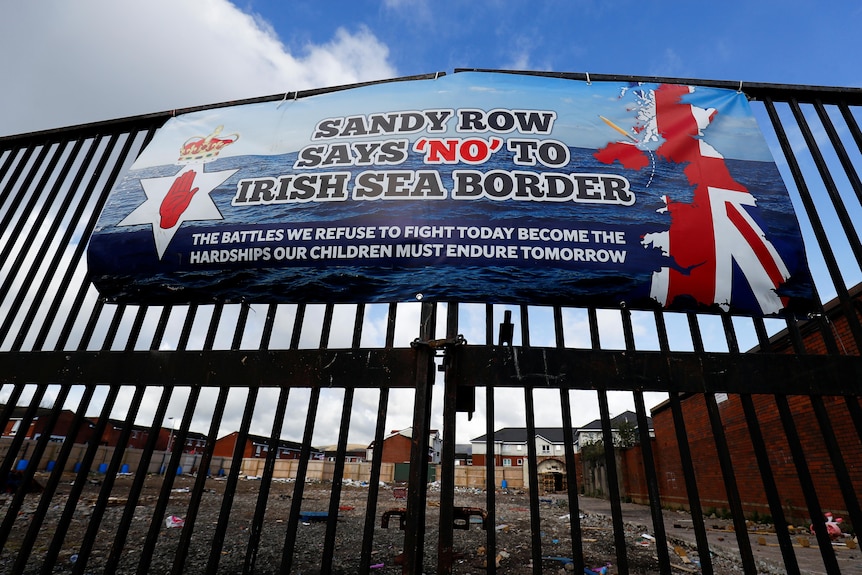 A banner reads "Sandy Row says 'no' to Irish sea border". 