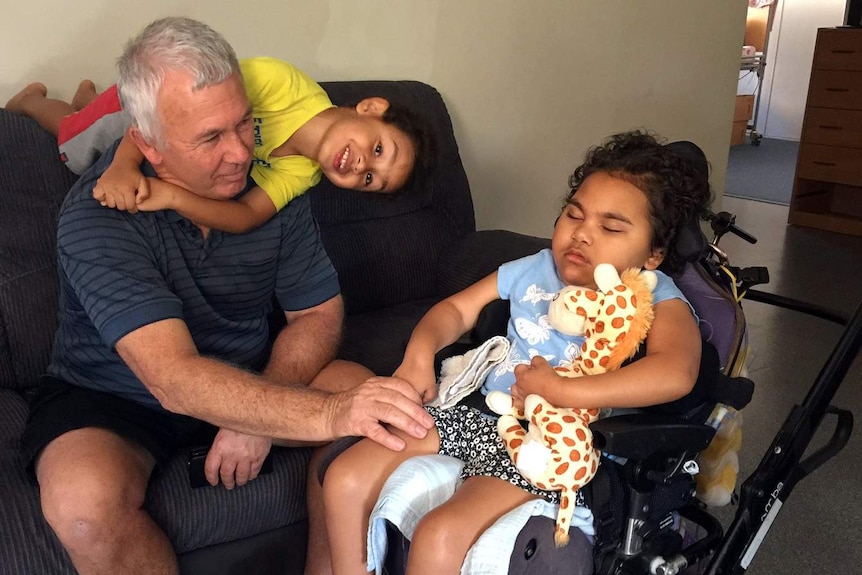 Brisbane father Steve Peek with daughter Suli