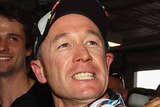 Greg Murphy snared pole position at a rainswept Bathurst.