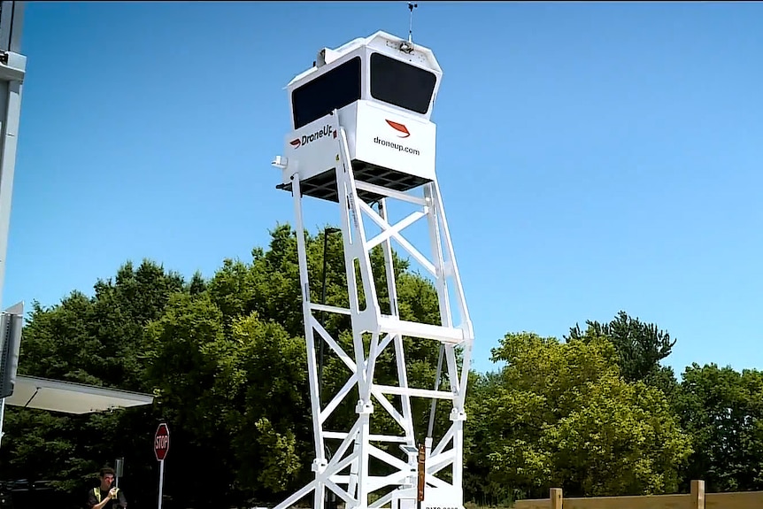 A watchtower in a carpark.