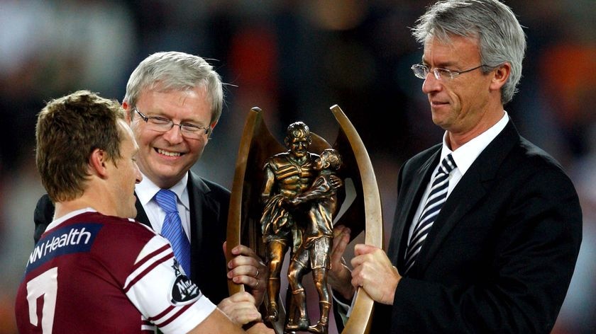 Prime Minister Kevin Rudd and NRL CEO David Gallop hand over the trophy to Matt Orford