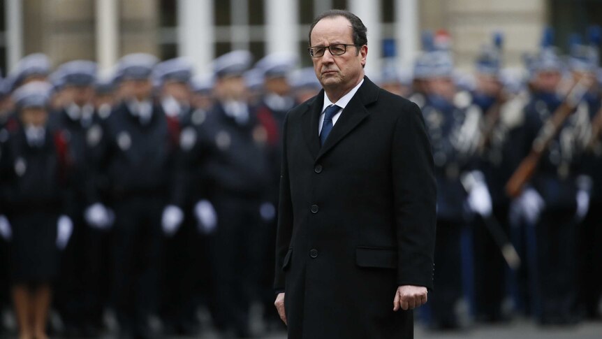 Francois Hollande at police officer ceremony