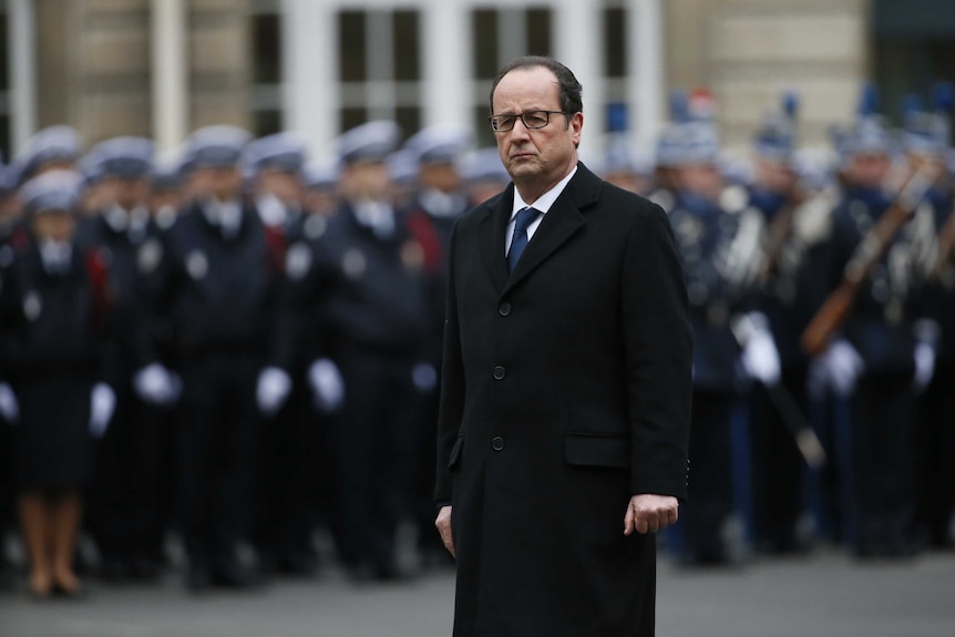 Francois Hollande at police officer ceremony