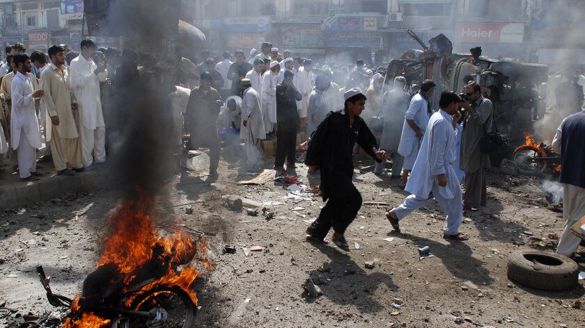 Locals survey deadly Peshawar car bomb