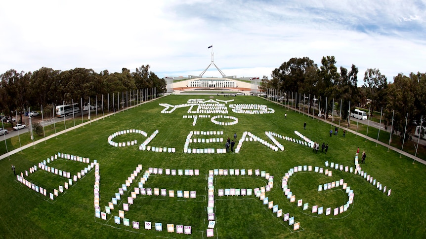 Placards on the lawn in front of Parliament House