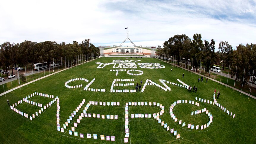 Placards on the lawn in front of Parliament House