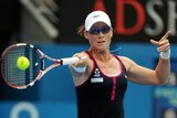Stosur plays a forehand against Pennetta