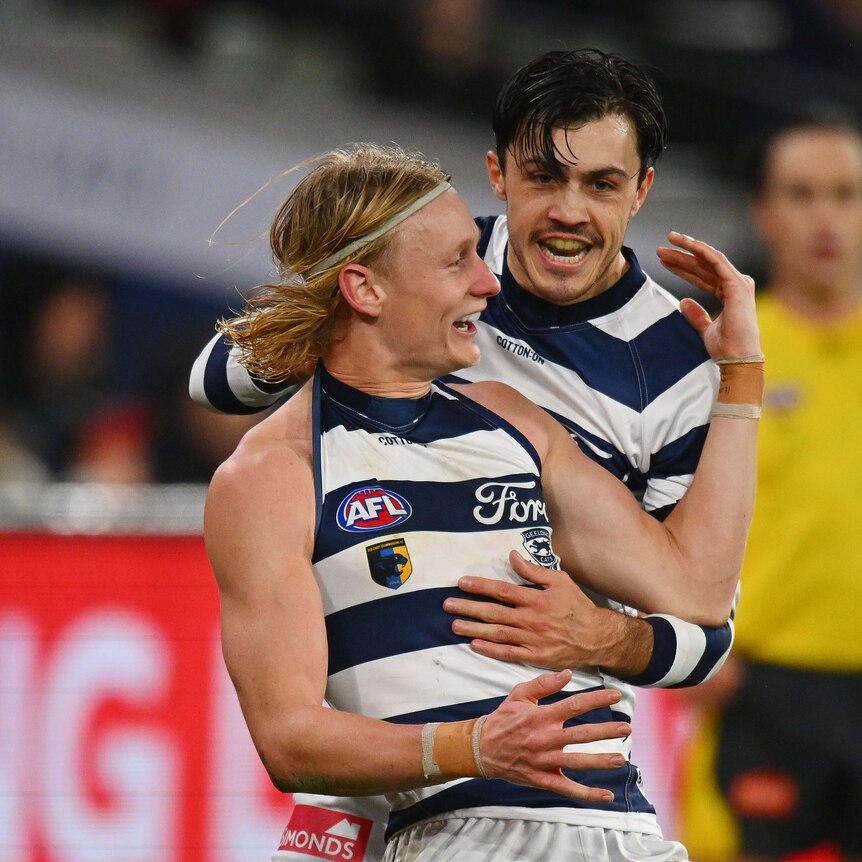 Ollie Dempsey celebrates a goal for Geelong