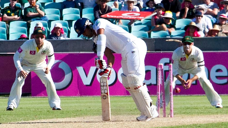 Dinesh Chandimal is bowled by Mitchell Starc.