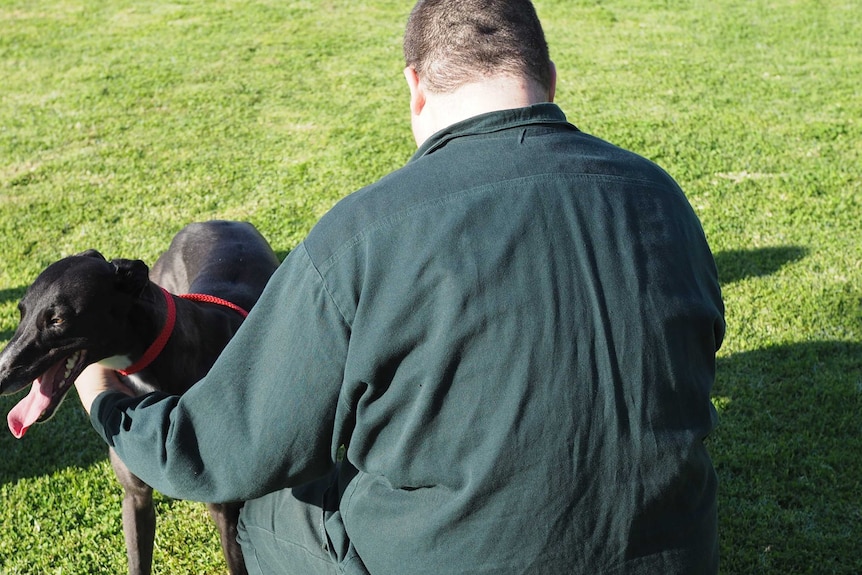 Prisoner at Bunbury prison with his dog