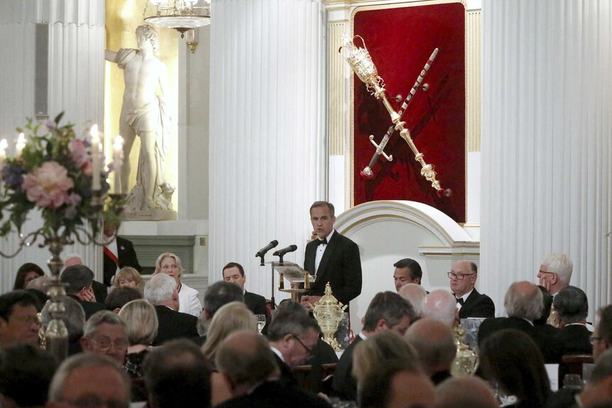 Bank of England Governor Mark Carney speaks during the Bankers and Merchants Dinner