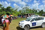 Voters queue at a polling station in Vanuatu