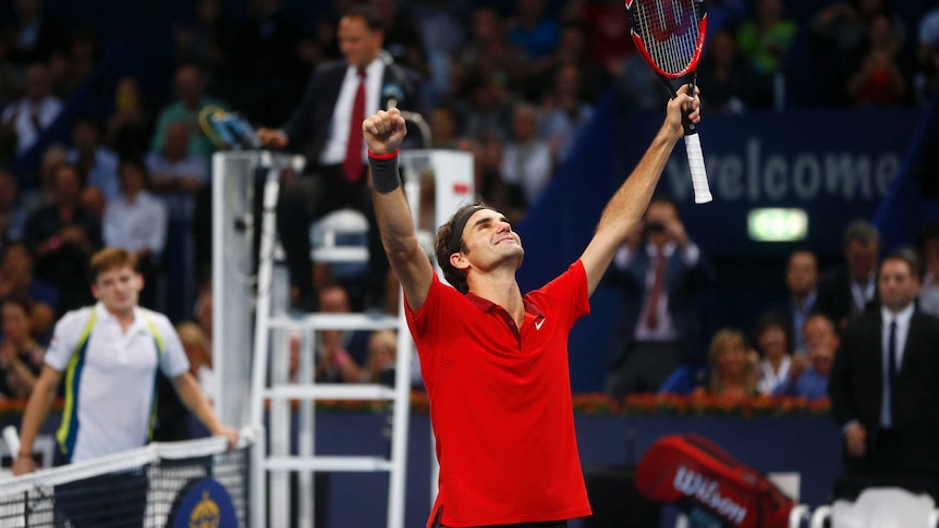 Roger Federer celebrates his victory in Basel