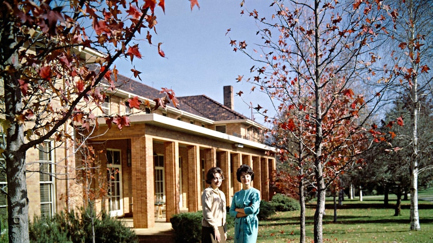 Two women stand out the front of Havelock House in 1963