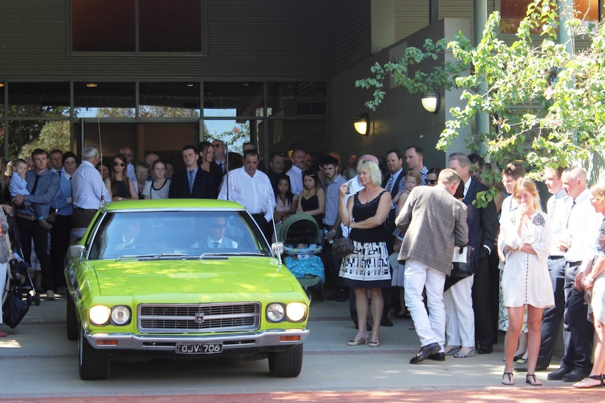 Ashley Adams' green ute at funeral service