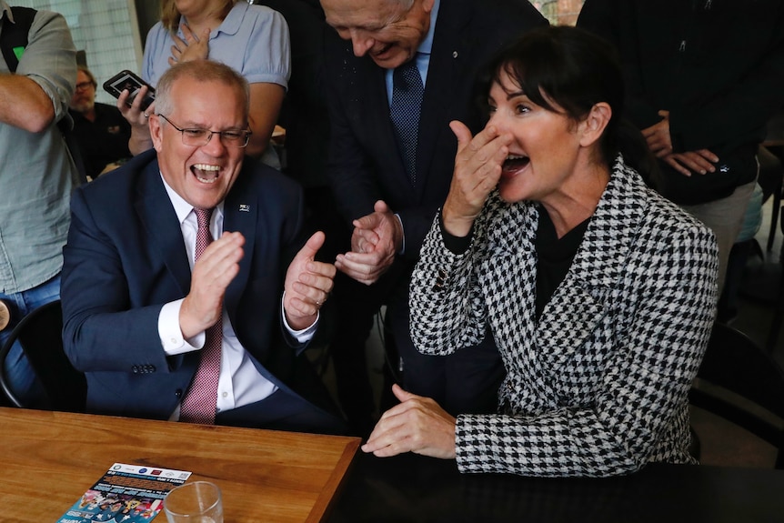 Scott Morrison laughing with his colleague Lucy Wicks