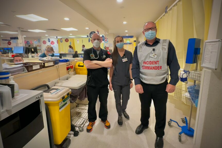 doctors and nurse standing in hospital emergency department
