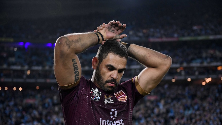 Greg Inglis has his hands on his head after loss
