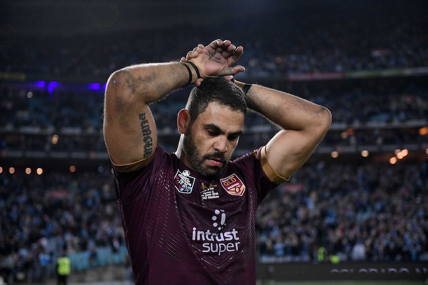 Greg Inglis has his hands on his head after loss