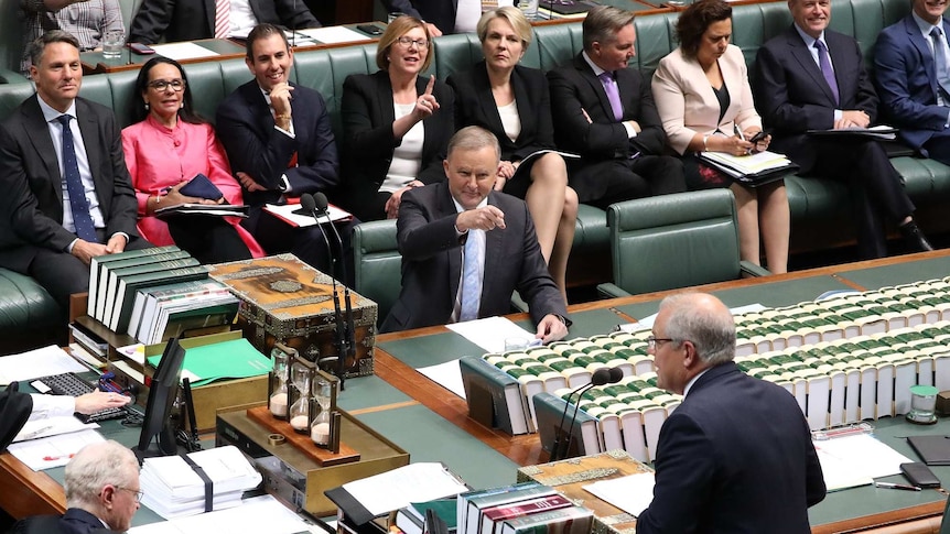 anthony albanese points at scott morrison in parliament