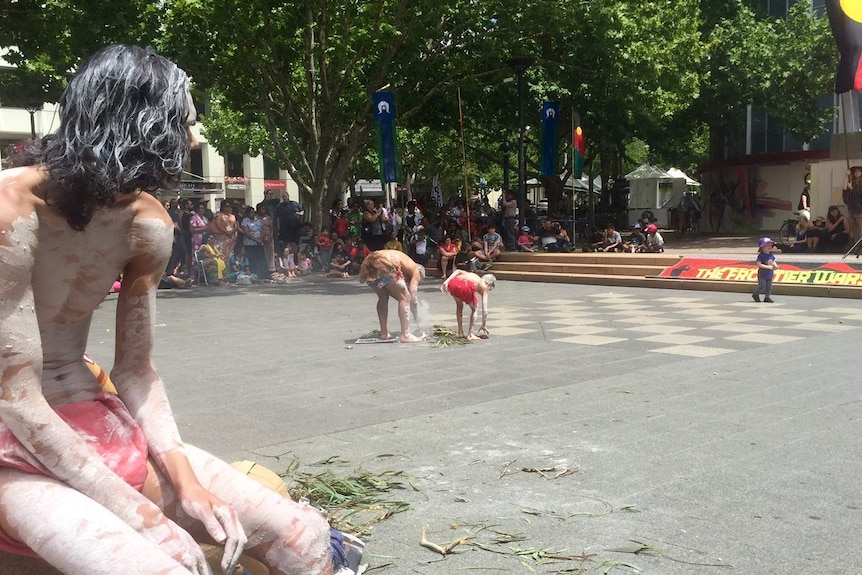 Invasion Day rally and smoking ceremony in Garema Place in Canberra.