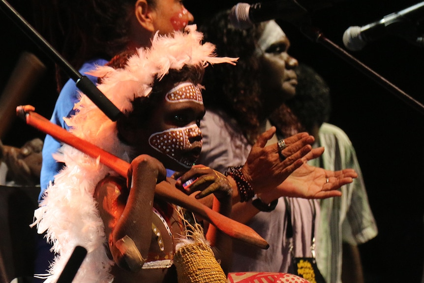 Aboriginal child in traditional paint at NIMA in Darwin 2016.