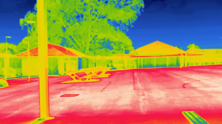 black asphalt, artificial grass and shaded areas, showing huge disparities between hot and cool zones in playgrounds