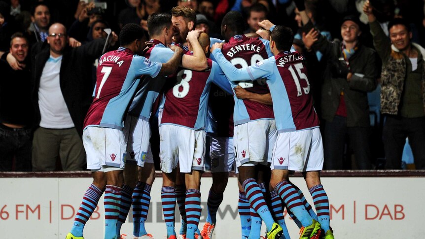 Aston Villa's Fabian Delph is congratulated by team-mates after his goal against Chelsea.