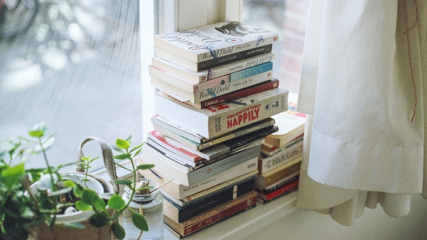 Stacks of books that are yet to be read: a monument to optimism, or an 'obligation graveyard'?