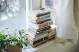 Stacks of books that are yet to be read: a monument to optimism, or an 'obligation graveyard'?