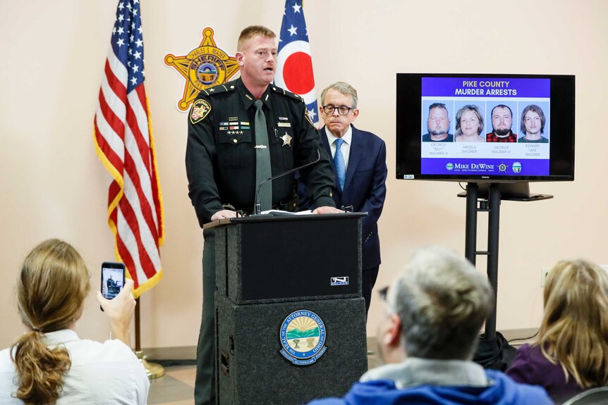 Pike County Sheriff Charles Reader, left, speaks alongside Ohio Attorney General Mike DeWine.