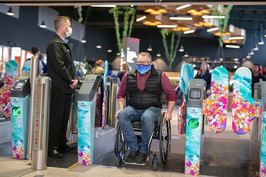 Train ticket machine decorated with Indigenous art