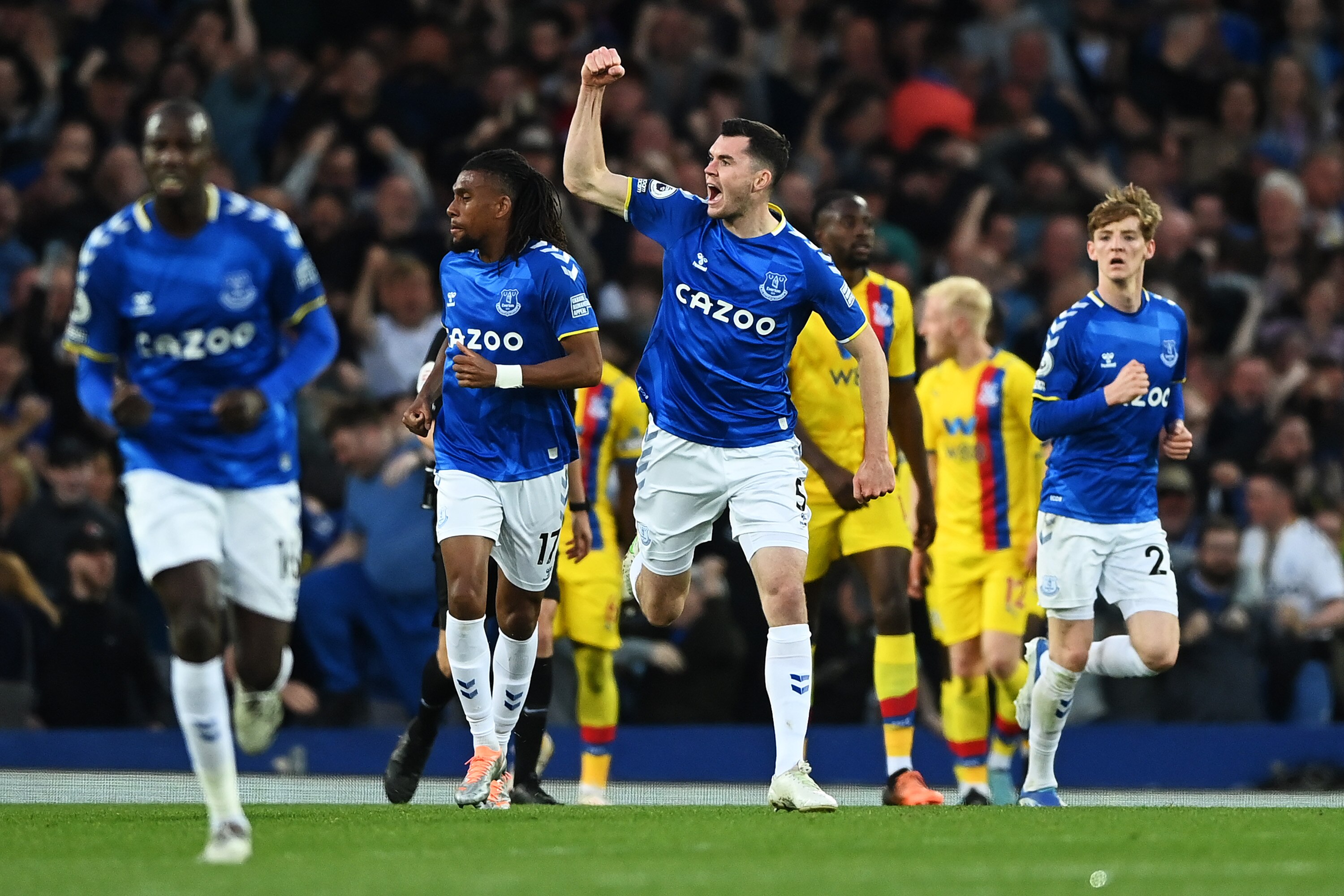 Fans flood the pitch as Everton escape Premier League relegation with