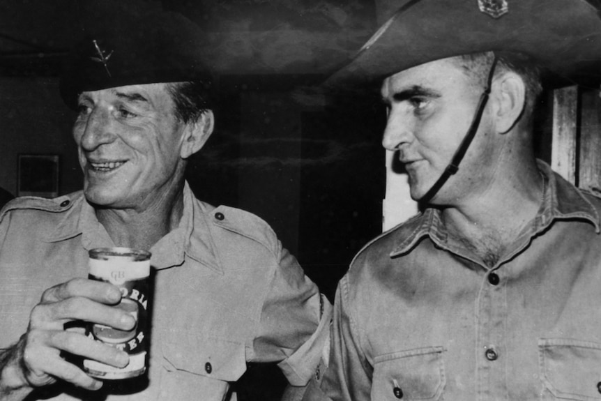 Keith Payne VC drinking beer with Ray Simpson VC